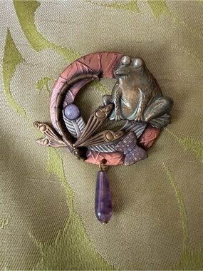 Brooch with whimsical frog and dragonfly on wreath in mixed metals. See photos